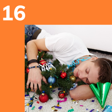 Photo of someone sleeping with christmas decoration around them